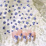 Amourwa 3D blueberry nail stickers and fruit nail decals product display. Showing trendy summer blueberry French tip manicure with white polka dots and bows on natural nails.