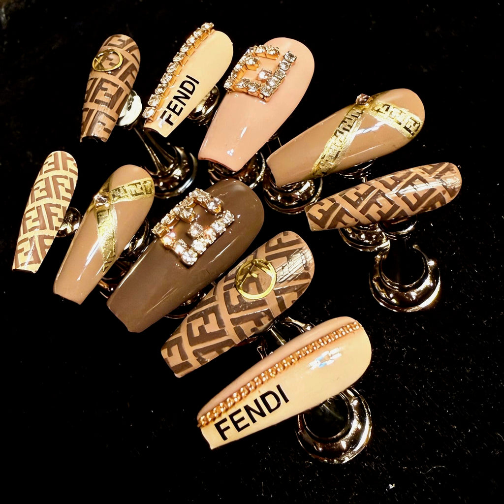 Handmade luxury Fendi style press on nails featuring iconic monogram pattern, designer false nails.