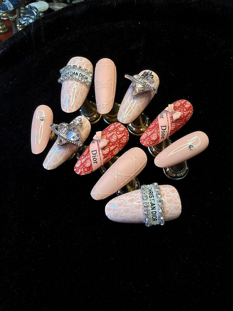 Pink Dior inspired glue on nails with luxury 3D charms and crystals, salon quality coffin fake nails.