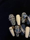 Blue and white Dior press on nails in coffin shape, designer glue on nails.