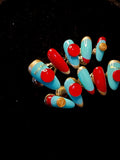 blue Miumiu inspired glue on nails featuring luxury 3D charms, salon quality coffin fake nails